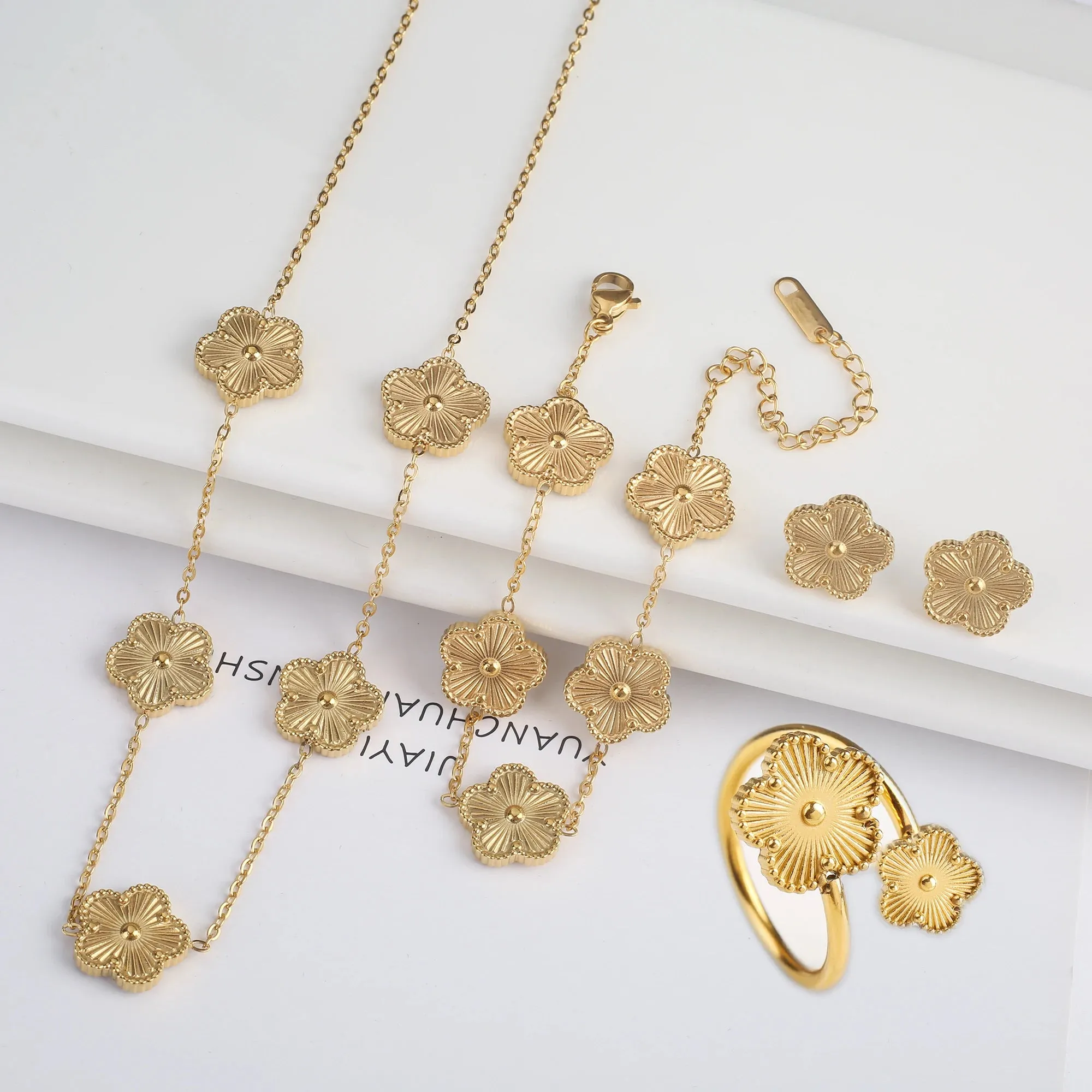 Five Leaf Flower Jewelry Set  Stainless Steel Necklace, Bracelet, Earrings & Ring for Women (4-Piece Luxury Set)