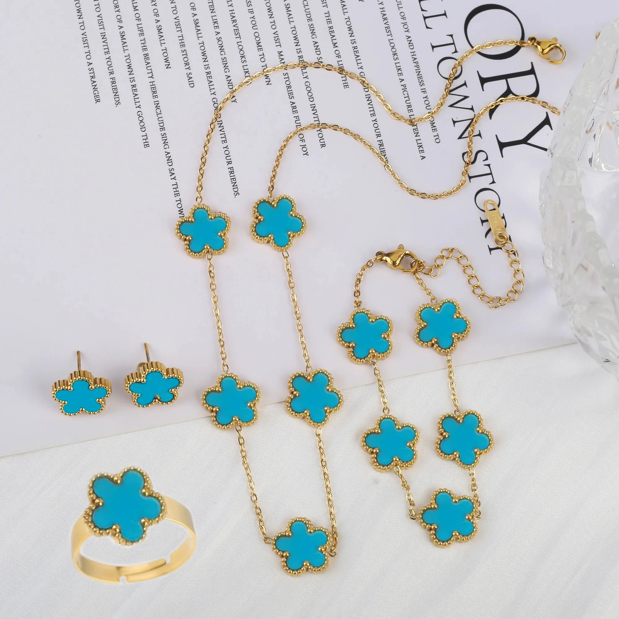 Five Leaf Flower Jewelry Set  Stainless Steel Necklace, Bracelet, Earrings & Ring for Women (4-Piece Luxury Set)