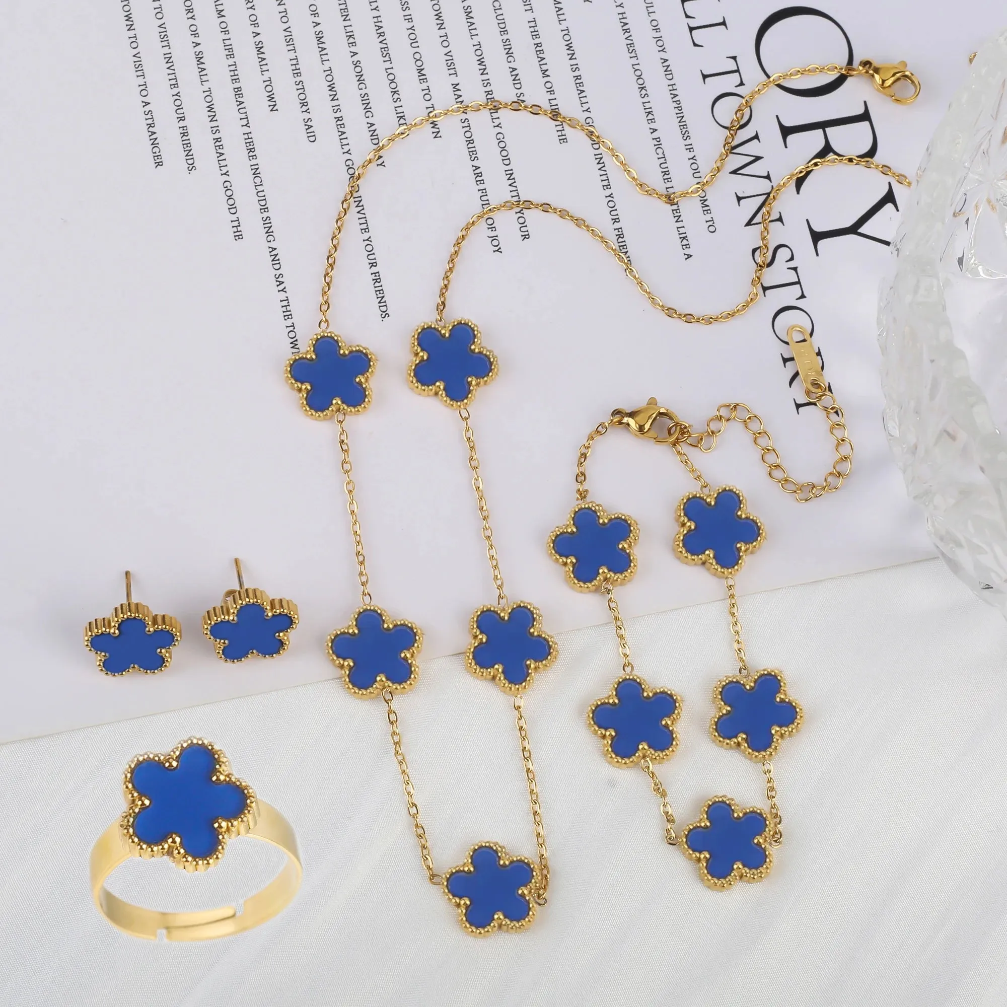 Five Leaf Flower Jewelry Set  Stainless Steel Necklace, Bracelet, Earrings & Ring for Women (4-Piece Luxury Set)